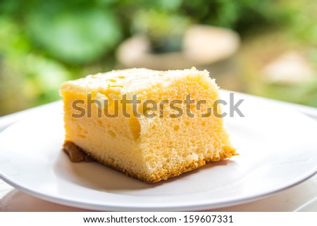 Cakes on a white dish is eaten.