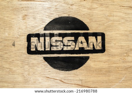 Thailand - Sep 10, 2014: Nissan logo of crates wood in warehouse, . Nissan Motor Company Ltd is a multinational car manufacturer headquartered in Yokohama, Japan.