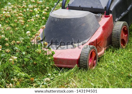 red electric lawn mower