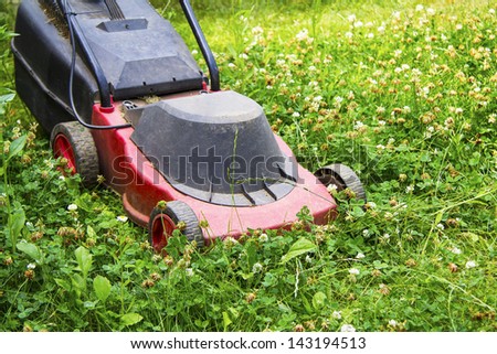 red electric lawn mower