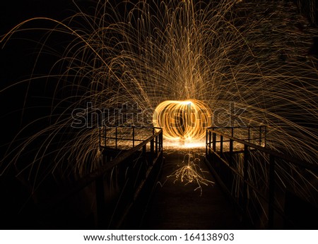 spinning burning steel wool