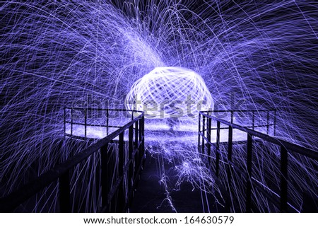 spinning colored burning steel wool