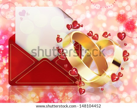 Beautiful card with two wedding rings and red envelope.