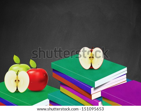 Stack of books with apples and clean blackboard.