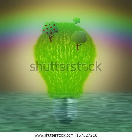 Trees and green grass grows on light bulb.
