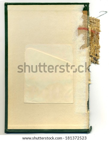 Vintage inside book cover page with library due date card pocket.