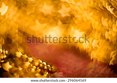 Colorful blurred background of pink and gold color, bokeh effects.