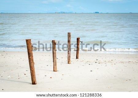 wooden pole on the beach, phuket Thailand