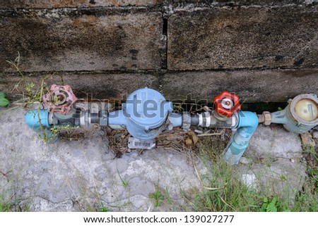 water pipe and meter with old wall