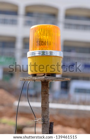 emergency light on a construction site signaling a dangerous zone