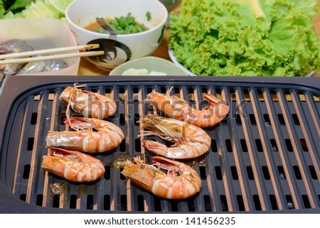 Grilled prawns on the barbecue rack, Grilled shrimps ready to be serve