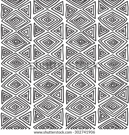 Geometric seamless pattern in ethnic style. Black and white graphics, diamonds, triangles, painted by hand.