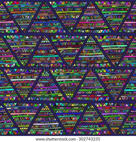 Seamless geometric pattern in ethnic style. Bright colorful folk triangular motifs on a dark blue background.