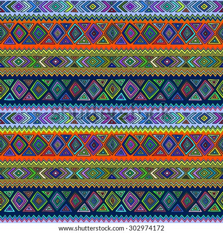 Geometric seamless pattern in ethnic style. Color graphics, diamonds, triangles, zigzags, stripes, painted by hand.