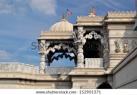 LONDON - AUGUST 29. Entrance canopy of Europe\'s first traditional Hindu temple, constructed in limestone and marble with components carved in India and assembled on site; August 29, 2013, London, UK.