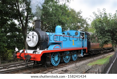 Didcot, Uk - October 5. Thomas The Tank Engine Is A Live Steam Engine, Based On Children'S Books By The Reverend Wilbert Awdry, Running On October 5, 2013 At Didcot Railway Centre, Oxfordshire, Uk.