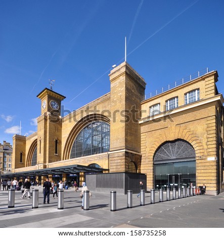 LONDON - OCTOBER 6. Renovated facade of King\'s Cross railway terminus for the east coast main line service from Edinburgh and Leeds, with new pedestrian concourse, on October 6, 2013, in London UK,