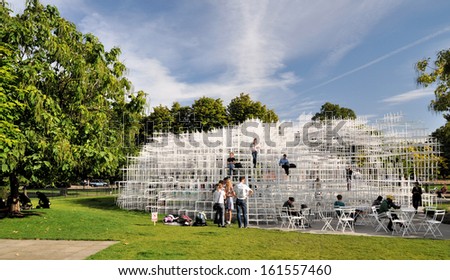 LONDON - SEPTEMBER 26. The annual competition to design the Serpentine Gallery summer pavilion is won by Sou Fujimoto with a delicate structure; September 26, 2013 in Kensington Gardens, London, UK.