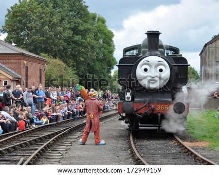 DIDCOT, UK - OCTOBER 5. A live preserved steam locomotive, bearing the face of the Thomas the Tank Engine stories, entertaining visitors on October 5, 2013 at Didcot Railway Centre, Oxfordshire, UK.