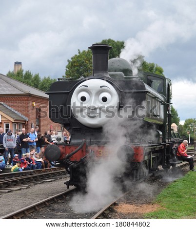 DIDCOT, UK -Â� OCTOBER 5. A live preserved steam locomotive, bearing a face from the Thomas the Tank Engine stories, entertaining visitors on October 5, 2013 at Didcot Railway Centre, Oxfordshire, UK.