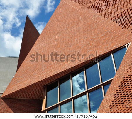 LONDON - JUNE 8. The new London School of Economics Student Centre on June 8, 2014, designed by Irish architects O\'Donnell & Tuomey, located in the narrow streets of historic Aldwych, London.