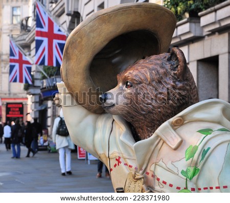 LONDON - NOVEMBER 4. A decorated street model of Michael Bond\'s fictional book character Paddington Bear, on November 4, 2014, for later charity auction; one of 50 designs located across London.