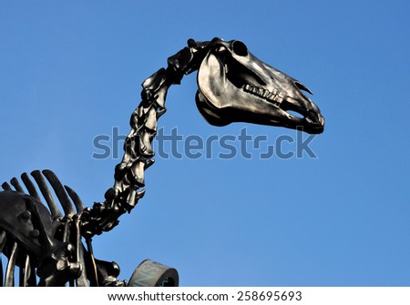 LONDON - MARCH 6, 2015. The head of Hans Haacke's Gift Horse; the skeletal statue is derived from a George Stubbs etching and is on temporary display on the fourth plinth in Trafalgar Square, London.