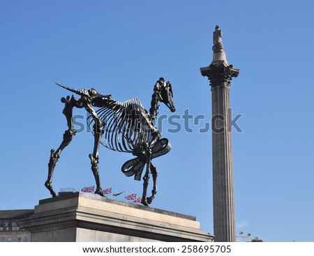 LONDON - MARCH 6, 2015. Hans Haacke\'s Gift Horse statue has an electronic ribbon displaying the Stock Exchange live ticker on temporary display on the fourth plinth in Trafalgar Square, London, UK.