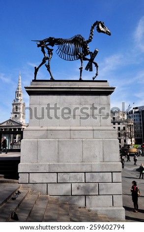 LONDON - MARCH 6, 2015. Hans Haacke\'s Gift Horse statue has an electronic ribbon displaying the Stock Exchange live ticker on temporary display on the fourth plinth in Trafalgar Square, London.