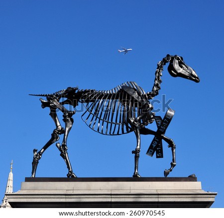 LONDON - MARCH 6, 2015. Hans Haacke\'s Gift Horse statue has an electronic ribbon displaying the Stock Exchange live ticker on temporary display on the fourth plinth in Trafalgar Square, London.