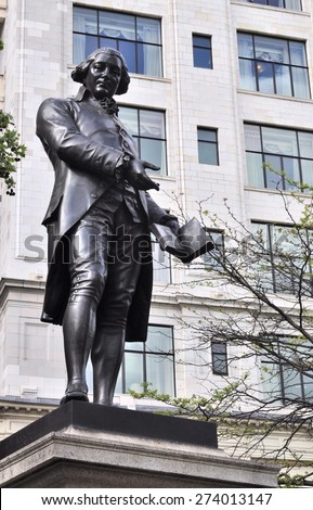 LONDON - APRIL 25, 2015. The statue of Robert Raikes, founder of Sunday Schools in the 18th century. The memorial was erected in 1880 located in Victoria Embankment Gardens, central London, UK.