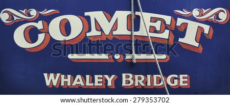 RICKMANSWORTH, UK - MAY 16, 2015. Narrow boats display their boat names in hand painted shadow typography on the Grand Union Canal at Rickmansworth, England, UK.