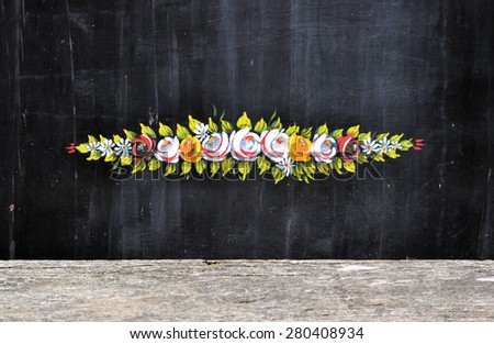 RICKMANSWORTH, UK - MAY 16, 2015. Hand painted decoration on a narrow boat mooring on the Grand Union Canal during the annual town festival in Rickmansworth, England, UK.