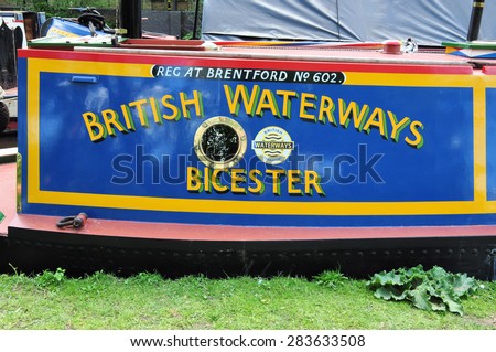 RICKMANSWORTH, UK - MAY 16, 2015. Hand painted shadow lettering on a narrow boat mooring at the Grand Union Canal at the town festival in Rickmansworth, England, UK.