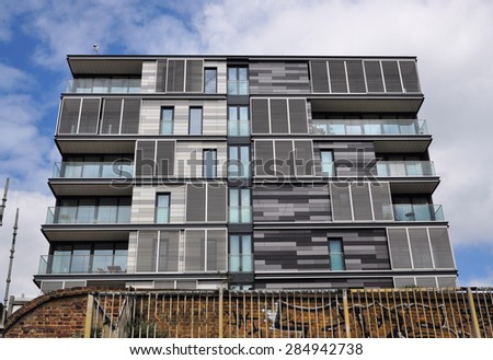 LONDON - MAY 25, 2015. A new block of apartments at King\'s Cross, an area undergoing major redevelopment in the Borough of Camden, London, UK.