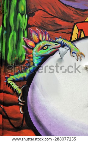 LONDON - JUNE 6, 2015. Detail of temporary spray painted mural by artist Morganico on the Old Church Street facade of the Chelsea Arts Club in the Royal Borough of Kensington and Chelsea, London, UK.