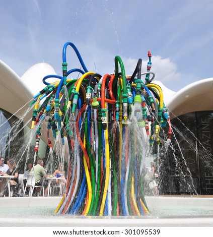 LONDON   JULY 18, 2015. The Fountain is a playful interpretation of a water feature using garden hoses by French artist Bertrand Lavier at The Magazine restaurant in Kensington Gardens, London, UK.