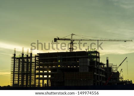 Silhouette building under construction