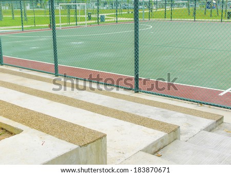 Concrete bench for spectators at futsal court
