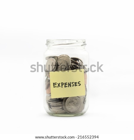 Isolated coins in jar with expenses label - financial concept