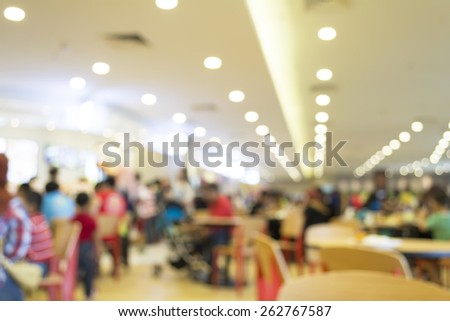 Food court and customer blurred background with bokeh and defocused lights