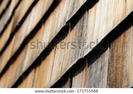 old wood shingle wall covering