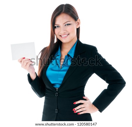 Portrait of a pretty young businesswoman holding blank card over white background