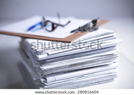 Big stack of papers ,documents on the desk