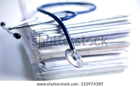 books folder file and stethoscope isolated on white background