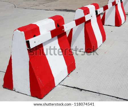 White and red color concrete barrier
