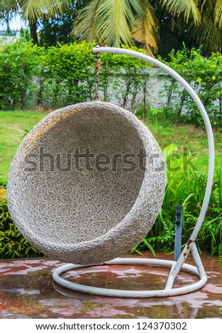 Hanging rattan chair for outdoor use