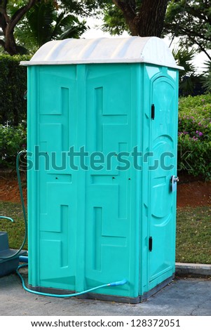 Green color Portable toilet ready to service people for outdoor event