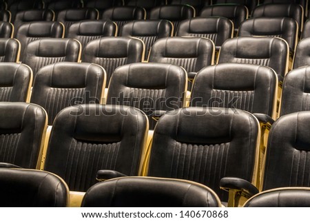 Theater seats in rows from front view