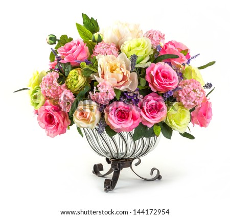 Bouquet of roses hydrangea and orchid in glass vase isolated on white